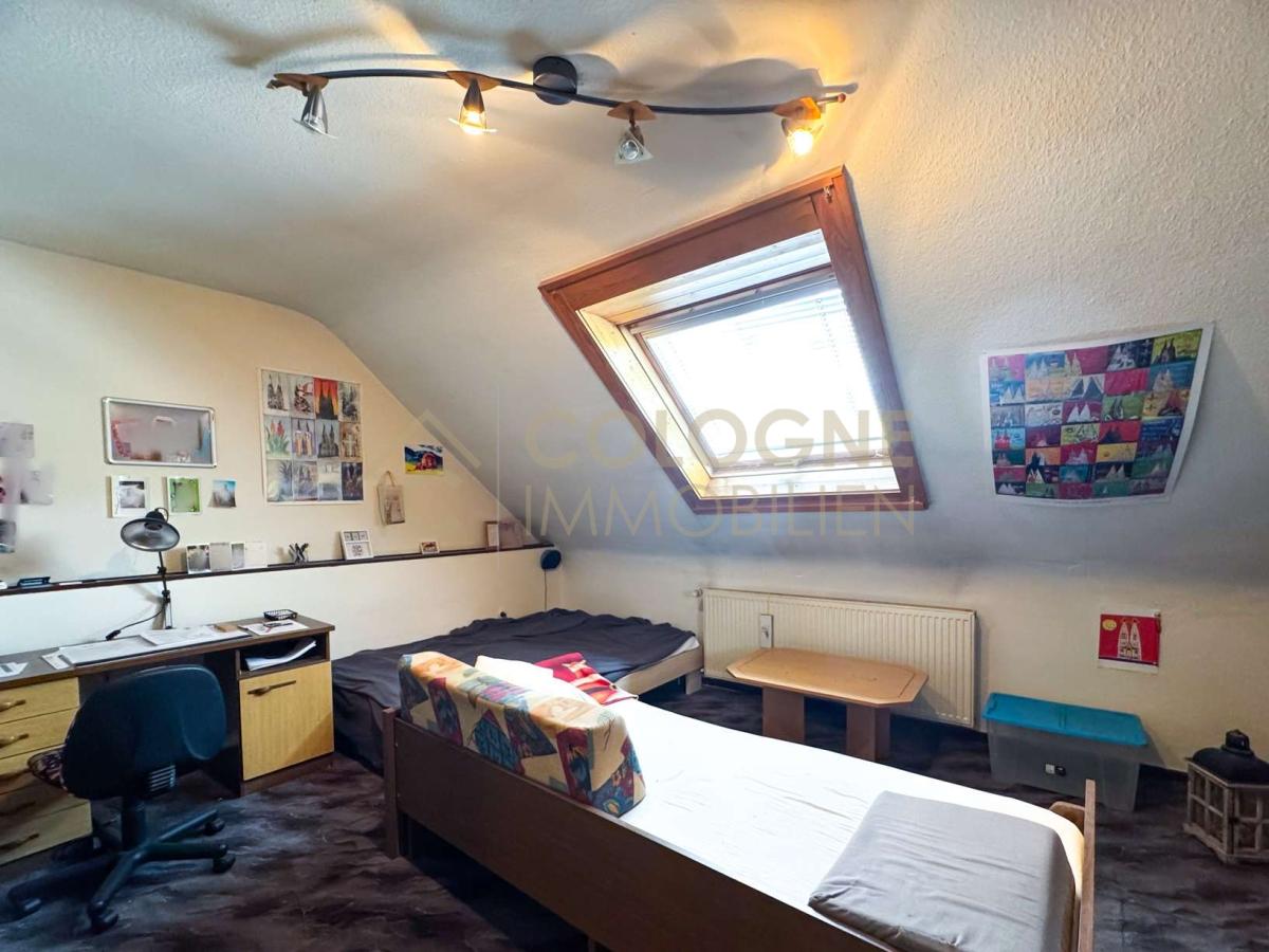 Gäste-/zweites Kinderzimmer im Dachgeschoss